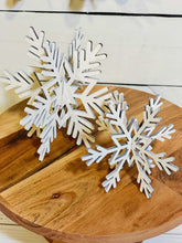 Load image into Gallery viewer, two sizes of snowflakes