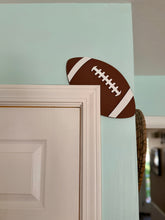 Load image into Gallery viewer, Football Shaped Door Corner Sign – Game Day Football Décor
